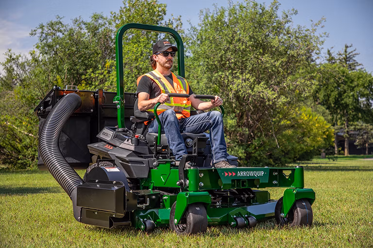 Commerical cutter using Arrowquip mower with bagger add-on