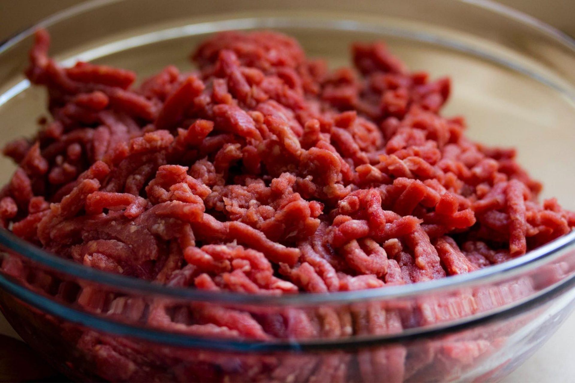 Raw Ground Beef in glass bowl