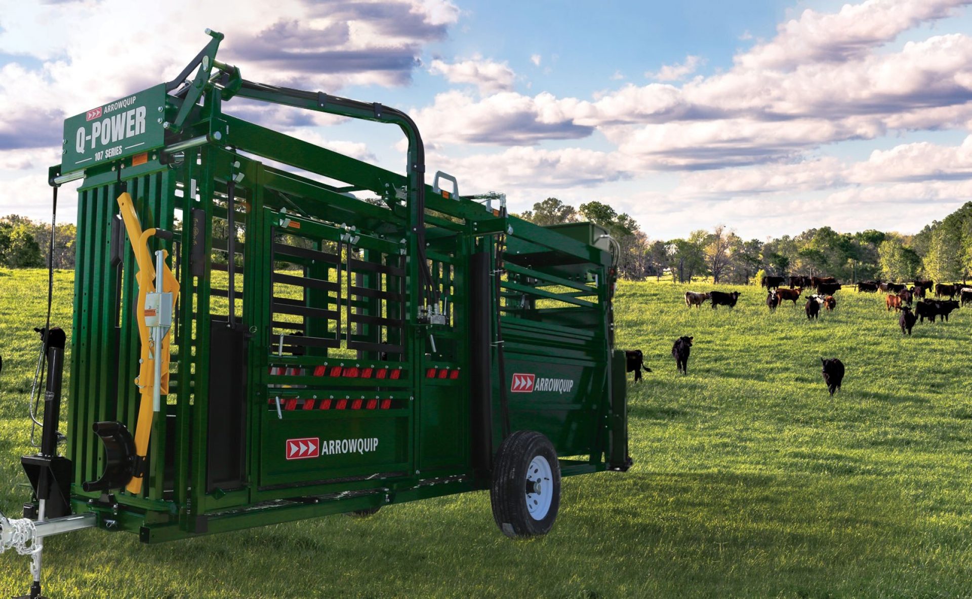 hydraulic mobile crush in a field with cattle