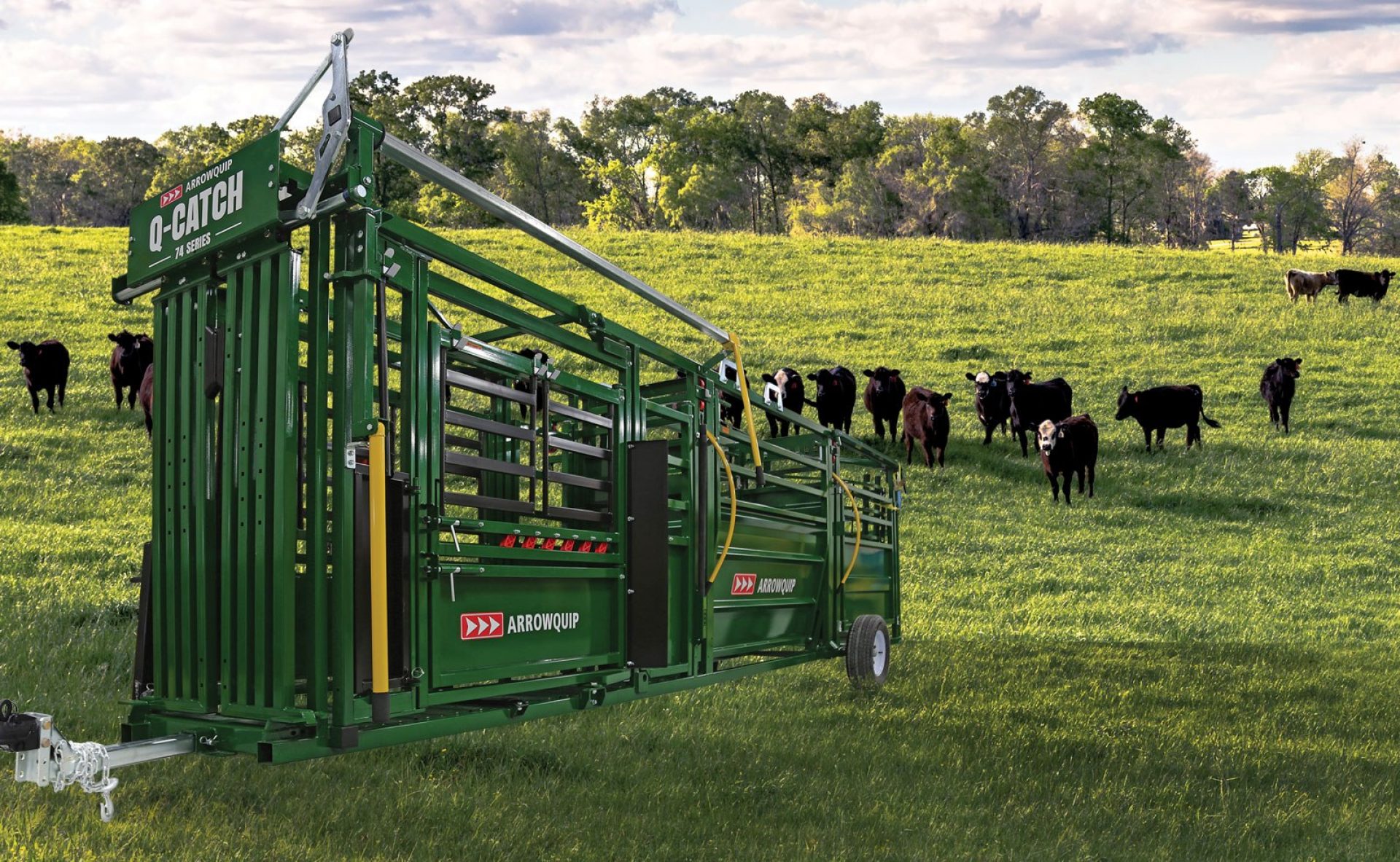 Q-Catch 74 Series portable squeeze chute, alley and tub in a field