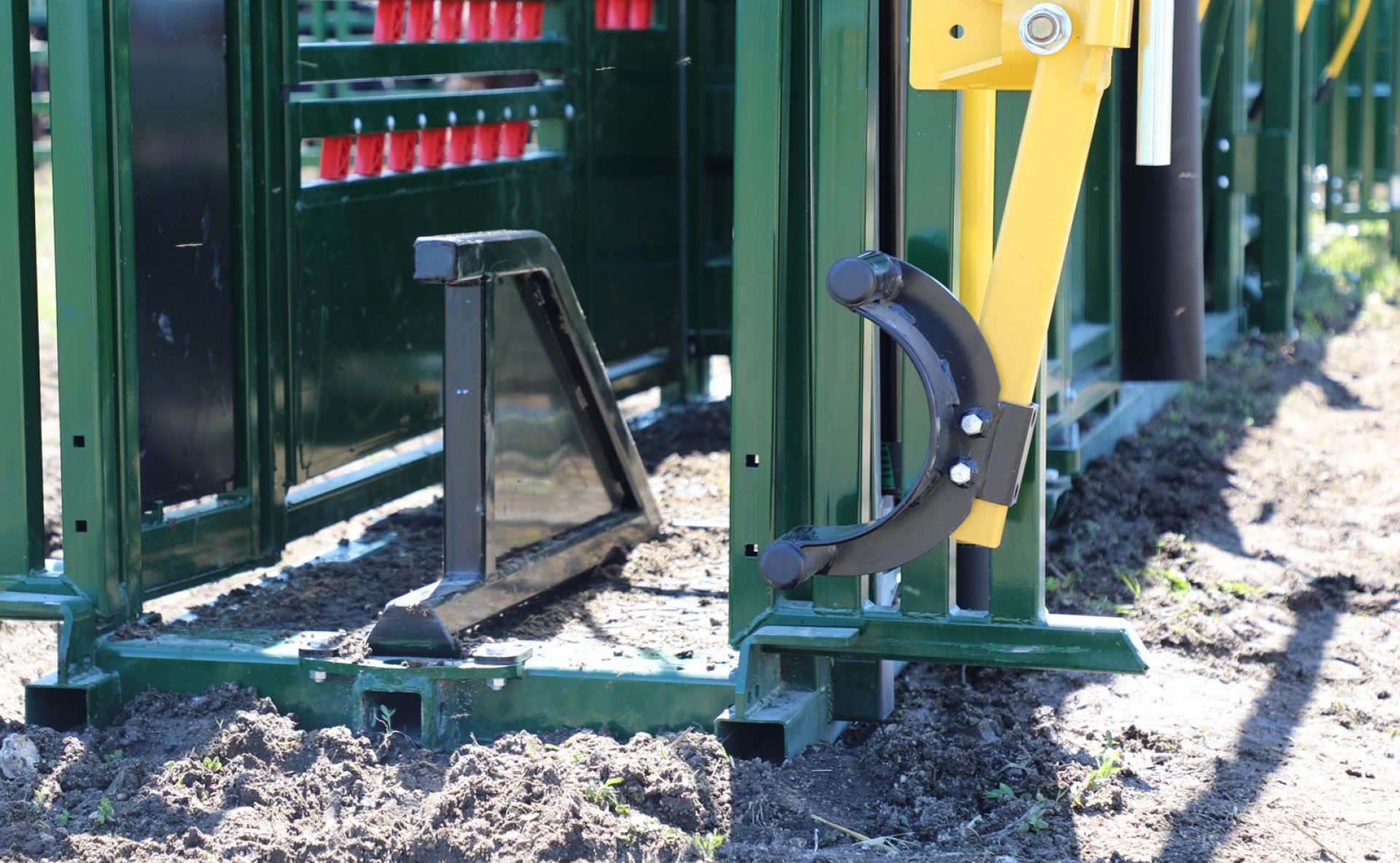Sheeted brisket bar for cattle chutes