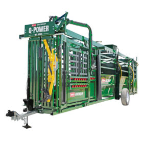 Portable Q-Power 107 Series hydraulic cattle chute, alley, and tub prepped for towing
